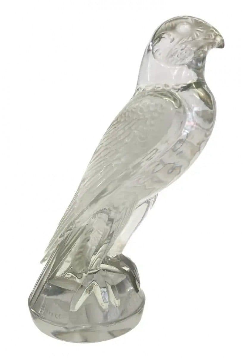 Mascotte « Faucon » en verre blanc